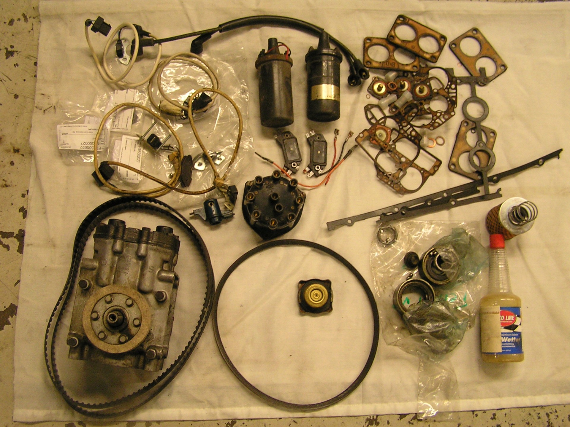 Parts replaced during the 2021 Autokinito major service — ignition components, carburetor gaskets, cambelts, distributor cap and ancillaries