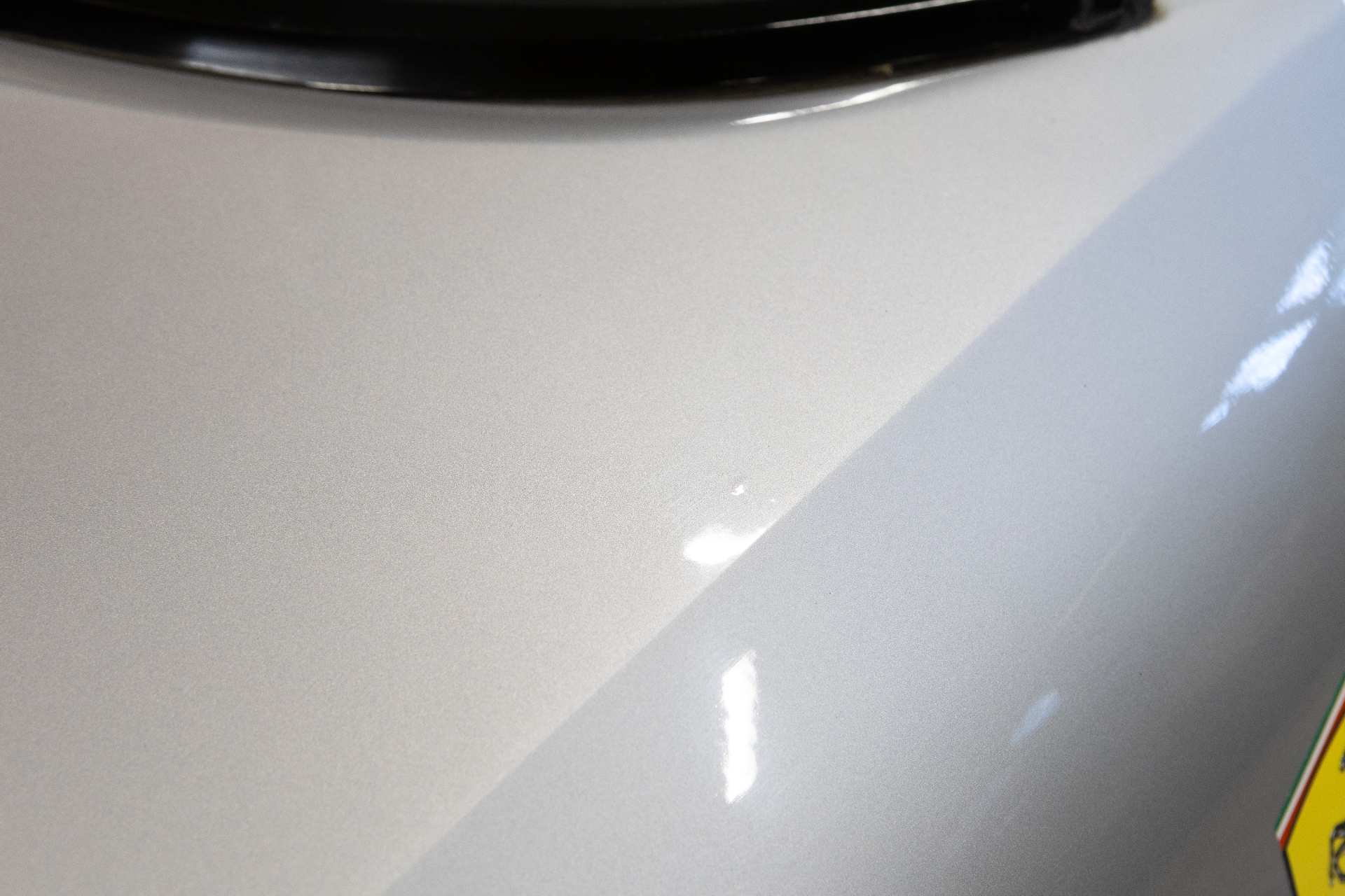 Front fender next to Scuderia shield with small paint mark