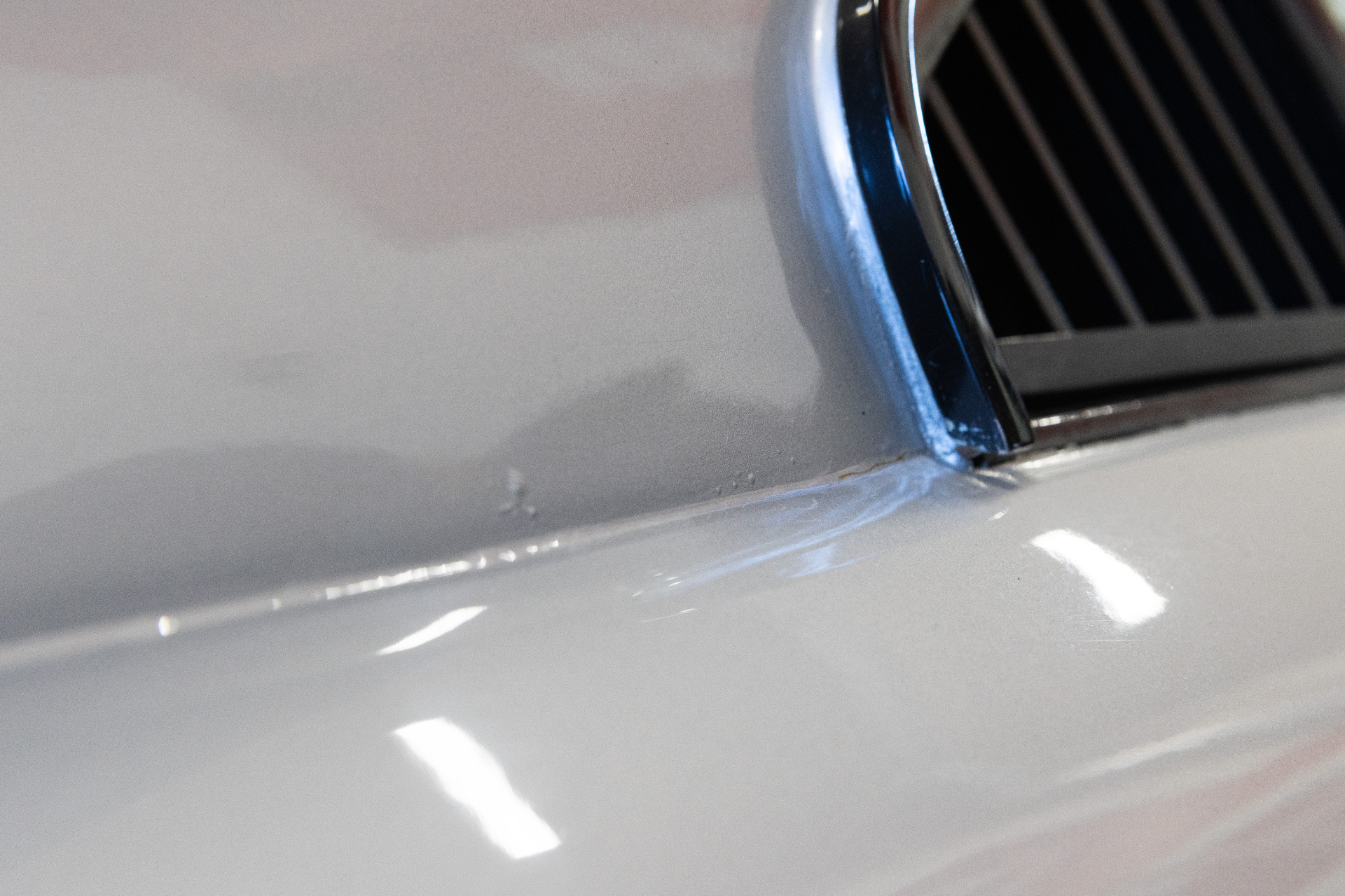 Paint wear at rear air intake