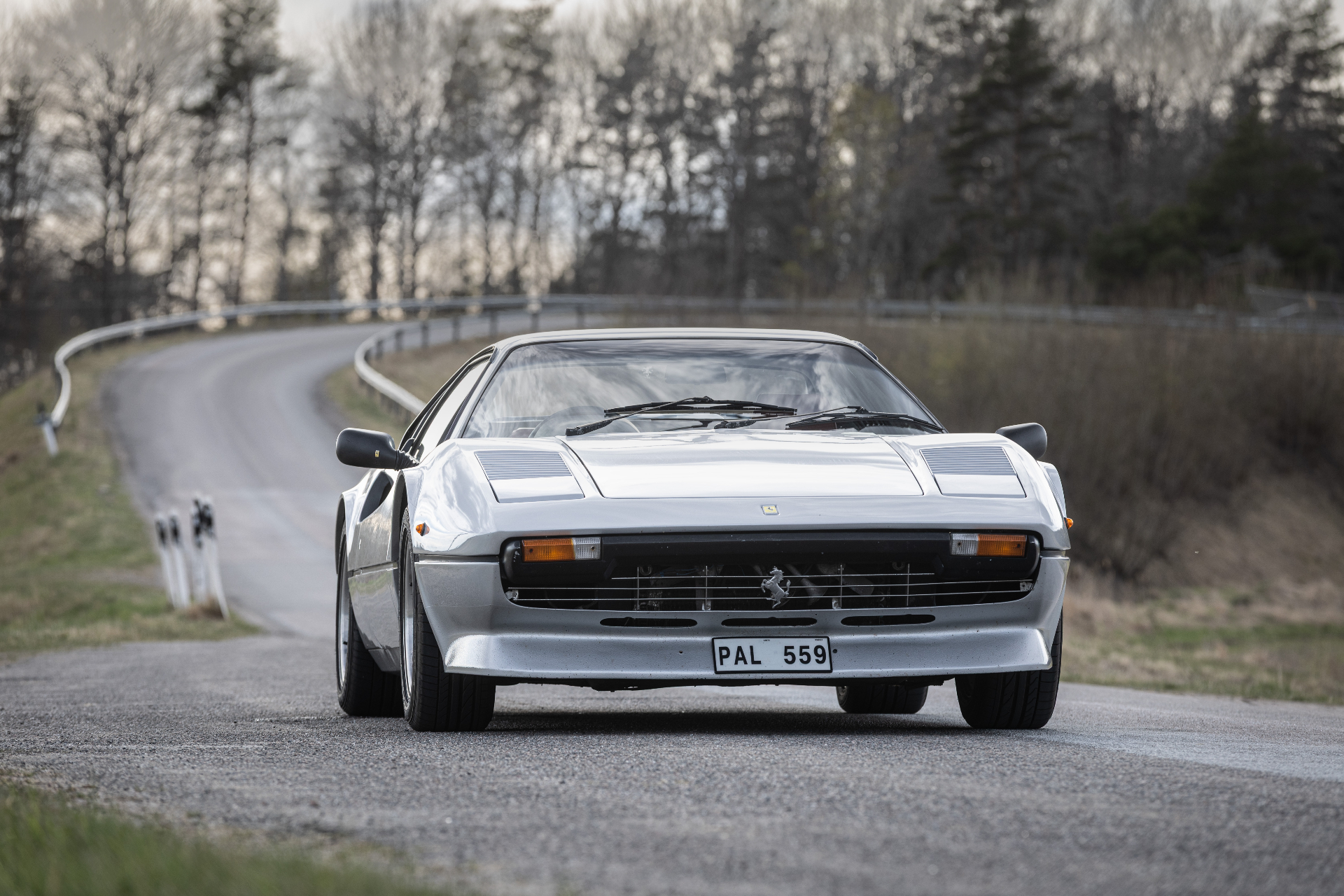 Ferrari 308 GTB head-on on a winding road