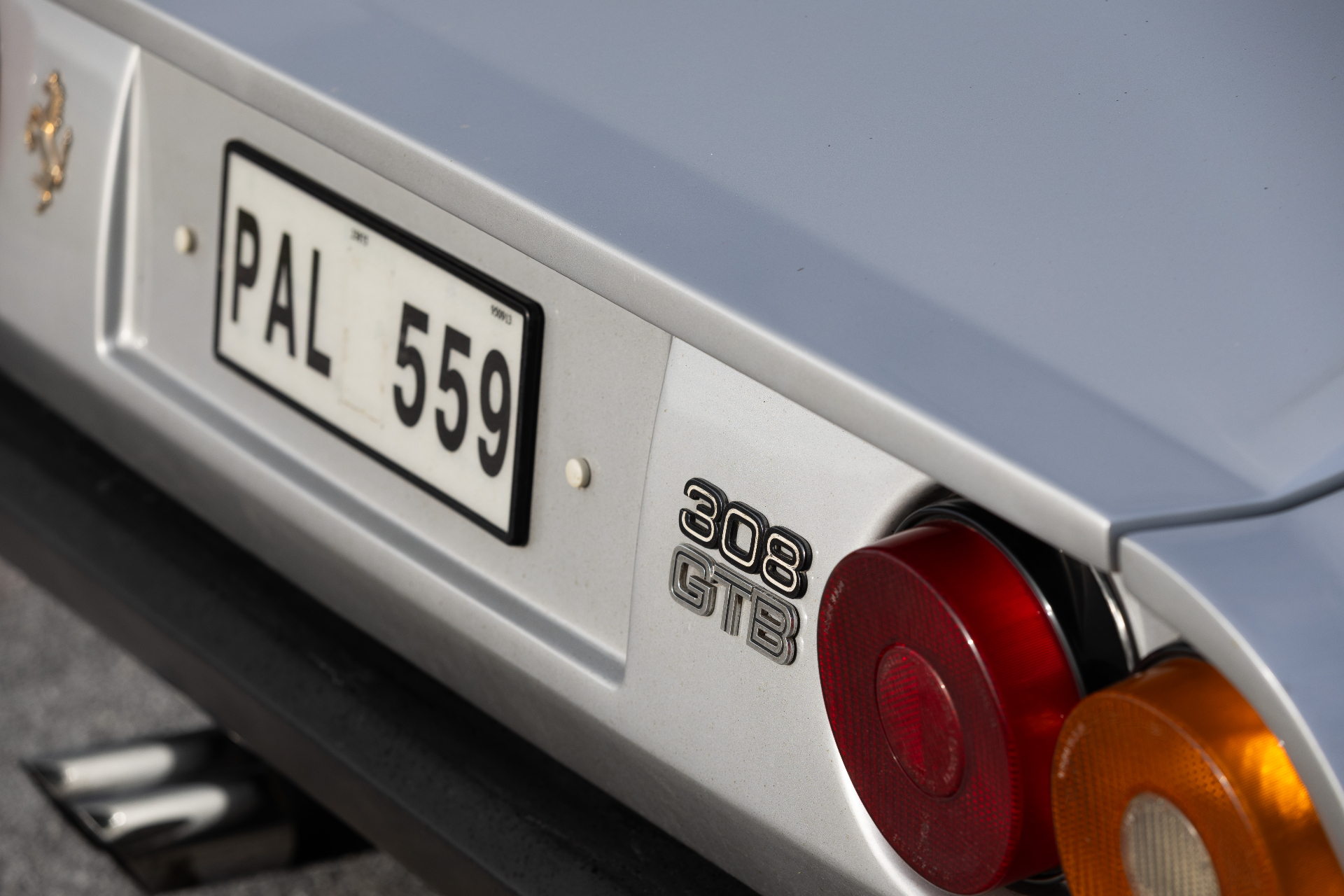 Rear with UK plate PAL 559, 308 GTB badge and round tail light